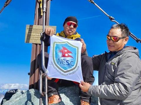 एनईएससीको झण्डा अष्ट्रियाको सबैभन्दा अग्लो हिमालमा फहराइयो
