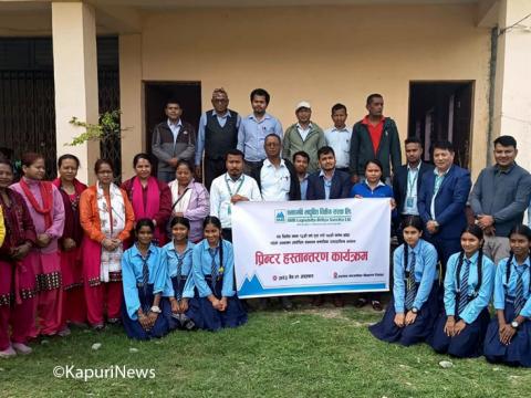 एनएमबी लघुवित्तद्वारा विद्यालयलाई कलर प्रिन्टर सहयोग